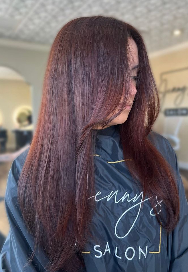 A photo of cherry cola hair at Jenny's Salon in Mechanicsburg, PA